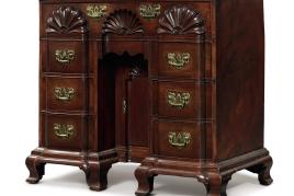 Lot 2089 Important Queen Anne Carved and Figured Mahogany Block-and-Shell Kneehole Bureau Table, Providence, Rhode Island, circa 1765 Height 34 1/2 in. by Width 37 in. by Depth 18 3/4 in. Est. $300/500,000 Sold for $672,500