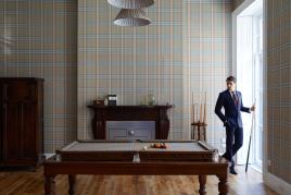 Featuring  a  vintage  oak  pool  table,  fitted  in  Huntsman-exclusive  Gregory  Peck  bespoke  tweed