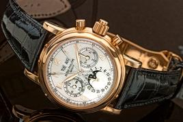 Patek Philippe A Fine Pink Gold Perpetual Calendar Split Seconds Chronograph Wristwatch with Moon-Phases Leap Year and 24 Hour Indication Ref 5004 Mvt 879877 Case 4115668 made in 2004 Estimate 120,000–180,000 USD