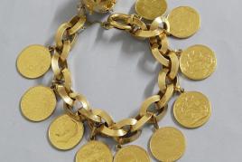 Bettelarmband,750er Gelbgold, hohl verarbeitet, mit 9 Goldmünzen