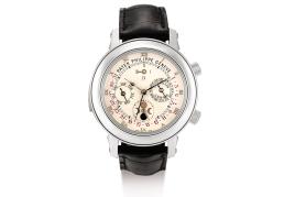 Lot 2352 - PATEK PHILIPPE. A PLATINUM DOUBLE DIAL WRISTWATCH WITH TWELVE COMPLICATIONS, REFERENCE 5002P