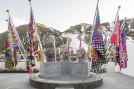 Fifteen flags, used as part of Gibson’s performance for the 2022 exhibition The Spirits are Laughing, on display outside the Aspen Art Museum. Courtesy of Jeffrey Gibson, Sikkema Jenkins & Co, New York, Roberts Projects, LA; and Stephen Friedman Gallery, London. Photo by Tony Pr