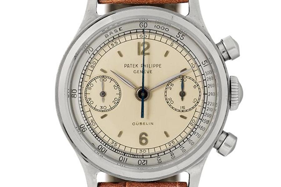 PATEK PHILIPPE. Stah Chronograph mit two-tone Zifferblatt, 1961. Ref. 1463. Verkauft für CHF 456 500.