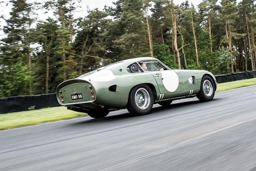 The 1963 Aston Martin DP215 Grand Touring Competition Prototype takes to the track (Credit – Simon Clay © 2018 Courtesy of RM Sotheby’s).