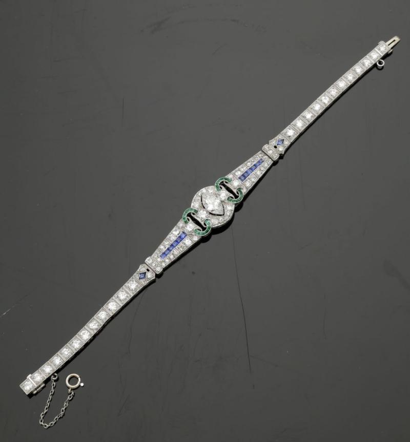 Los 648  Diamantarmband Frühes Art Déco, um 1925 Platin, ca. 22,4 g. Rundum mit 80 Altschliff ausgefasst, zus. ca. 7,0 ct. Schätzpreis: 	12.000 - 15.000 EUR