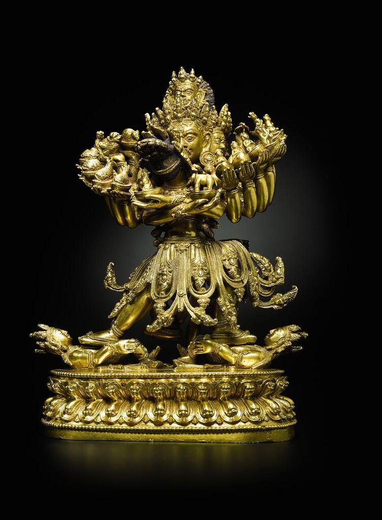 Lot 65 Gilt bronze Figure of Kapaladhra Hevajra.