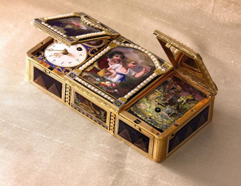 Lot 83 The Cherry Pickers An Exceptional Three Compartment Gold Enamel and Pearl Musical Snuff Box with Concealed Automaton and Timepiece Made for the Chinese Market Attributed to Piguet & Capt The Enamel Painting Attributed to Jean-Louis Richter Circa 1800 Est.$400/600,000 Sold for $490,000