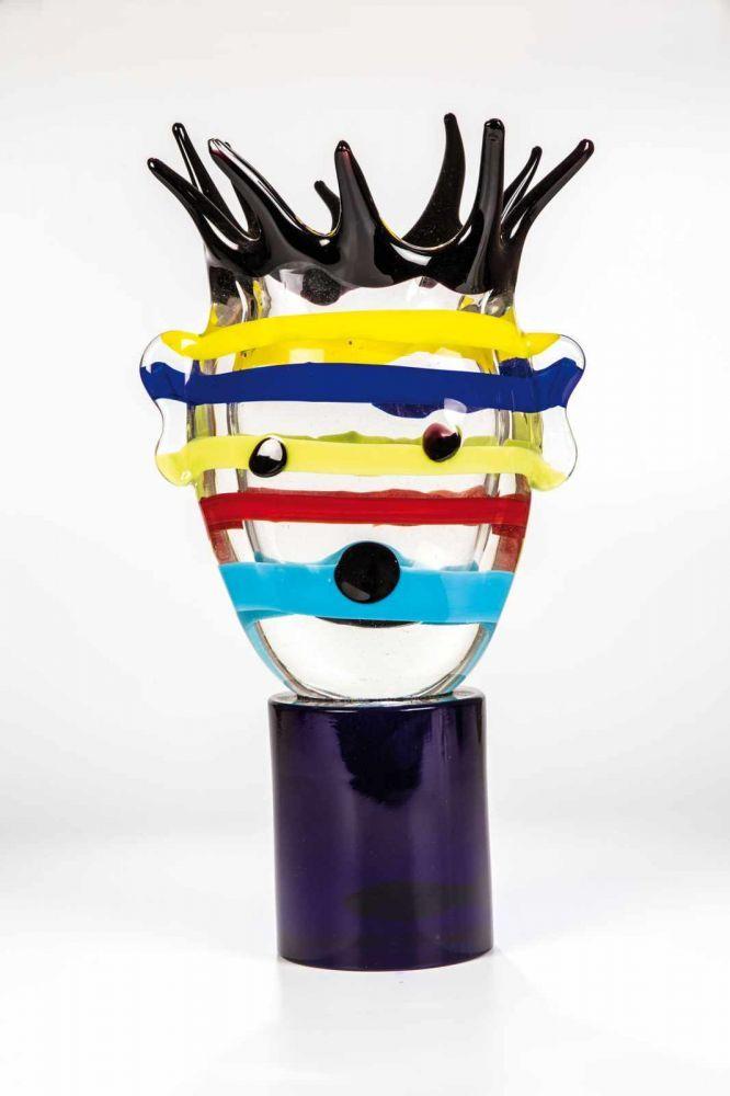 "Multi - Striped Head" Kiki Kogelnik für Berengo, Murano, 1995 Farbloses Glas mit mehrfarbiger Bandeinschmelzung, frei geblasen und geformt.  Schätzpreis:	26.000 - 30.000 EUR