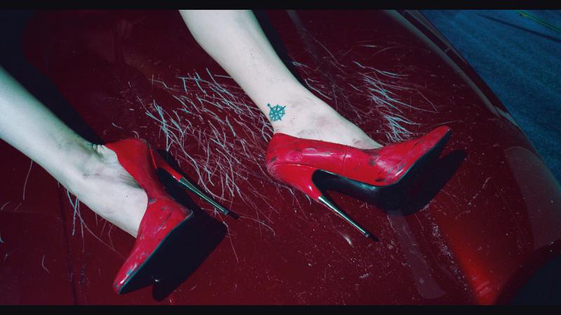 Lot 237 Steven Klein Killer Heels unique chromogenic print, flush-mounted to aluminum, 2014, printed in 2017, no. one in an edition of one; accompanied by a signed, dated, and editioned Certificate of Authenticity (2) 34 by 60 3/8  in. (86.4 by 153.4 cm.) Estimate $18/22,000