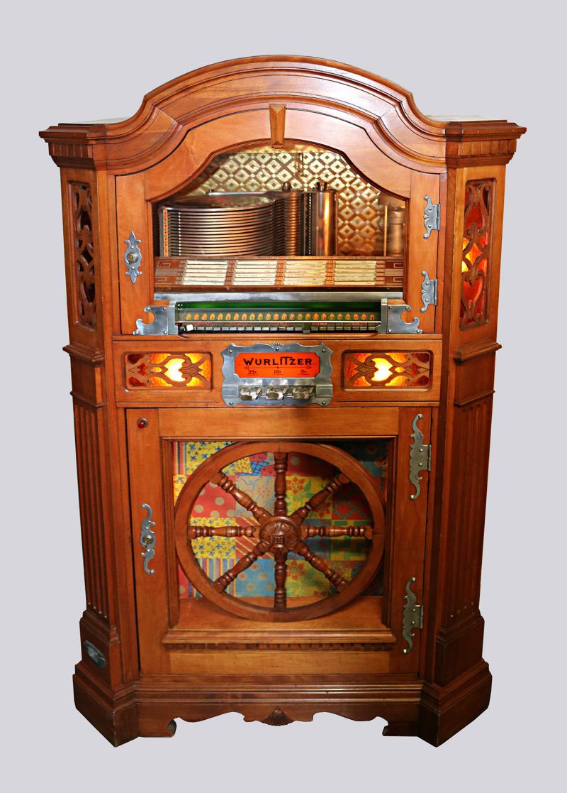 Musikbox Wurlitzer Model 780 "Wagon Wheel", 1940/41, komplett befüllt mit 24 Schellacks, dekoratives Kultgerät, Rufpreis € 1.200