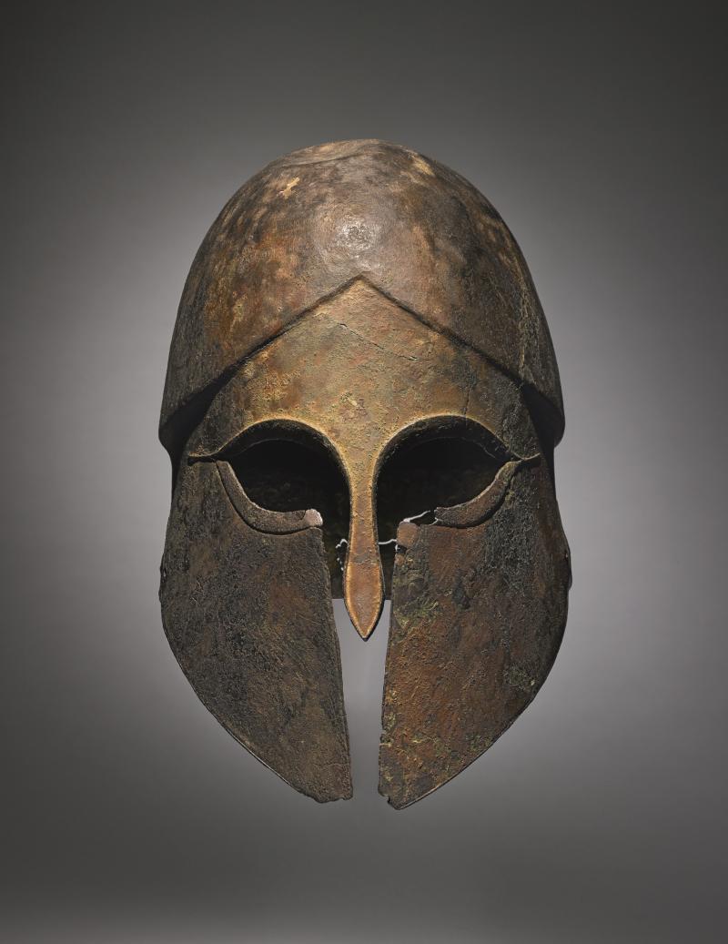 Lot 5 A Greek Bronze Helmet, circa late 6th Century B.C.