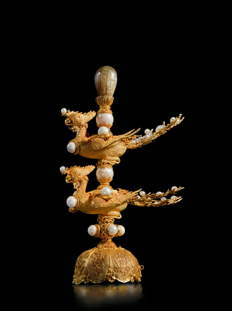 ot 552 Property Of The Portland Museum Of Art, Maine An Extremely Rare Gold Filigree 'Phoenix' Finial For An Imperial Concubine Court Hat Qing Dynasty, 18th Century Height 5 3/4  in., 14.6 cm  Estimate $60/80,000 Sold for $471,000