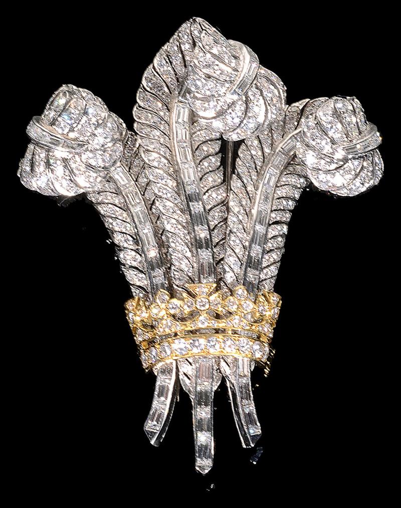 A diamond Prince of Wales Feathers brooch after the original which was gifted to Wallis Simpson by Edward VII, £4,000 - 6,000.