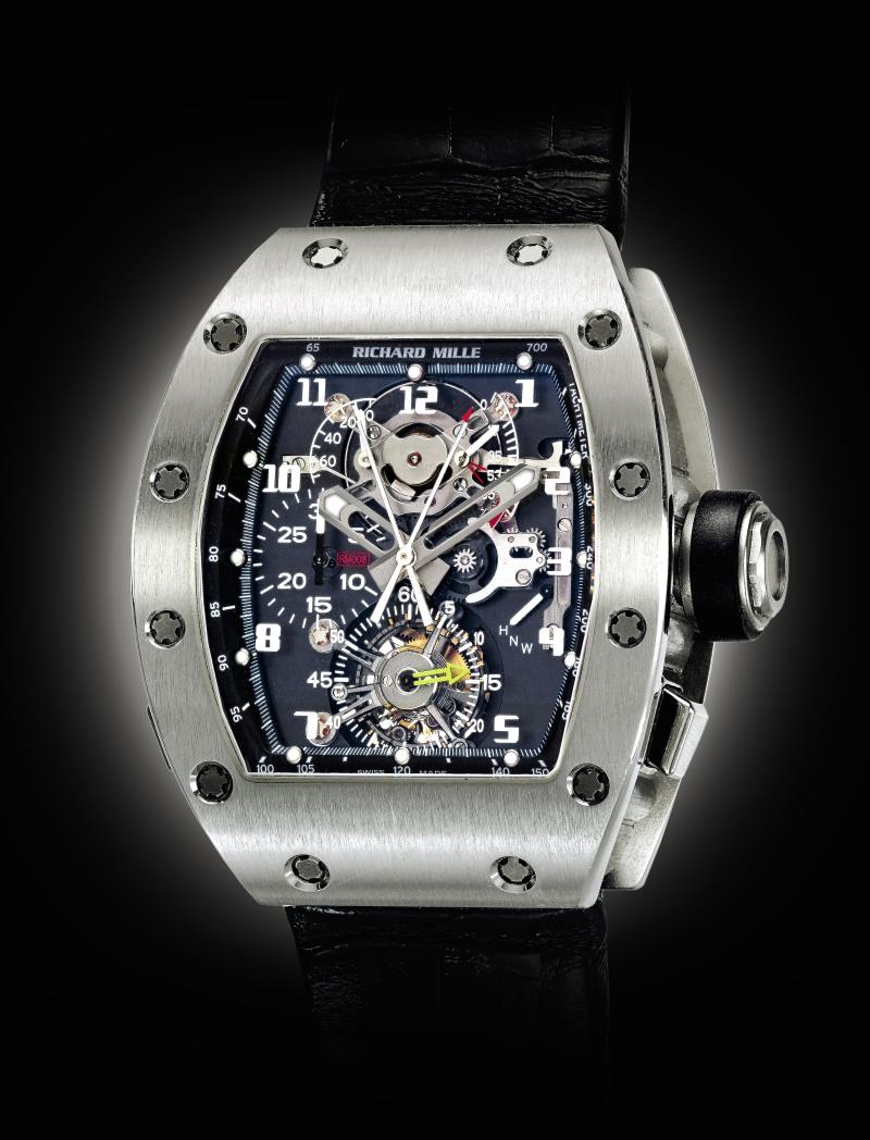 Lot 240 A Collection of Modern Complicated Wristwatches from an American Collector  Richard Mille An Impressive Platinum Tonneau Form Tourbillon Split Seconds Chronograph Wristwatch With Power Reserve And Torque Indication Mvt 13 Rm008 Ag Pt No 24 Circa 2006 Estimate $250/500,000 Sold for $423,000