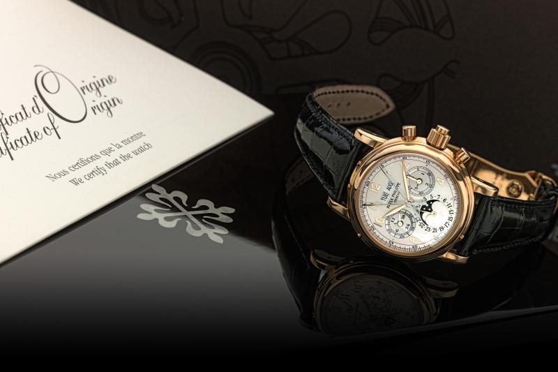 Lot 95 Property from a Private West Coast Collector Patek Philippe A Fine Pink Gold Perpetual Calendar Split Seconds Chronograph Wristwatch With Moon-Phases Leap Year And 24 Hour Indication Ref 5004 Mvt 879877 Case 4115668 Made In 2004 Estimate $120/180,000 Sold for $193,750