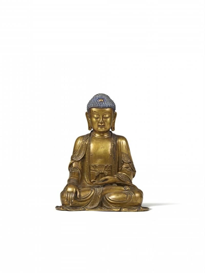 Lot 694 Nr. 386 195 Seltene große feuervergoldete Bronze-Figur des Buddha Shakyamuni China, späte Ming-Zeit, 17. Jh. H 50 cm Prov. Aus einer rheinischen Privatsammlung, erworben bei Lempertz, Köln, 11.12.1931, Lot 582, Tafel 3, seither in Familienbesitz Schätzpreis: € 200.000 – 250.000,- Ergebnis: € 312.000,-