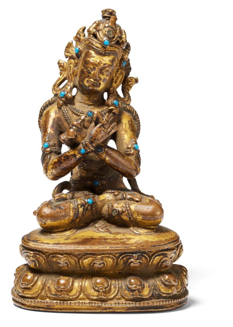 Figur des Vajradhara Tibet | Ca. 15./16. Jh. Kupferbronze mit Resten von Feuervergoldung und Steinbesatz | Höhe 8,3cm Taxe: 3.000 – 5.000 Euro