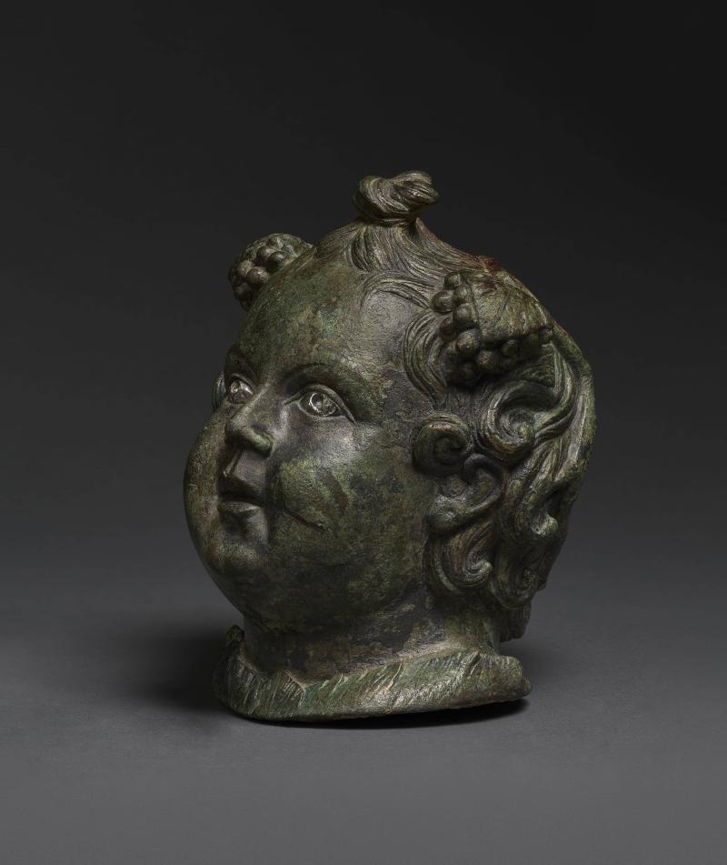 GALLERIES/DANIEL KATZ GALLERY LTD, Roman 2nd century AD  Infant Bacchus steelyard weight  Bronze, with silver eyes and filled with lead  20 cm high