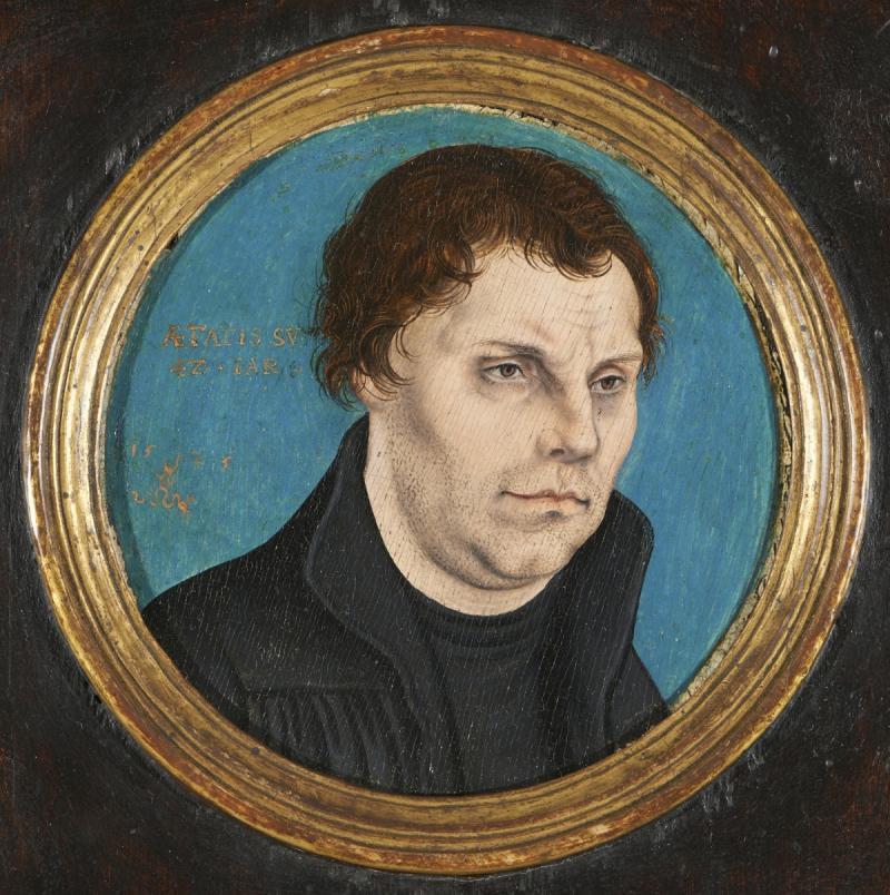 Detail aus Lucas Cranach d. Ä. (* 1472 in Kronach, † 1553 Weimar) Tondo mit dem Porträt Martin Luthers, 1525, Öl auf Holz, Durchmesser: 12,5 cm Signiert unten links mit geflügelter Schlange und datiert 1525 Inschrift: AETATIS SV 42 – JAR