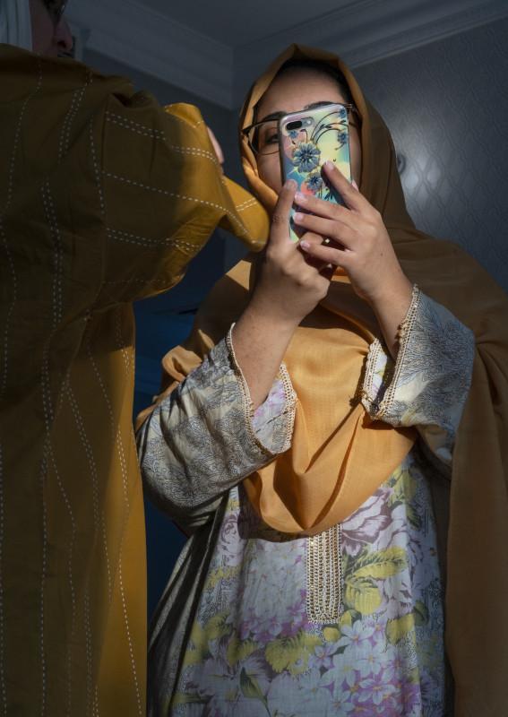 Farah Al Qasimi, S and A on the Phone, from the Imitation of Life series, 2020. Courtesy of Third Line, Dubai, and Helena Anrather, New York.