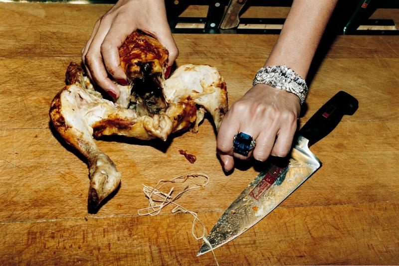 Helmut Newton Chickenand Bulgari Jewels, French Vogue, Paris, 1994 © Helmut Newton Foundation