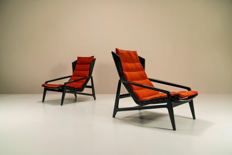 Gio Ponti (Milan 18-11-1891 - Milan 16-09-1979)  Provenance  Italian Collection - Original Label  Detail Description  Italy, 1957. Gio Ponti “Model 811” lounge chairs in stained walnut and upholstered in orange/red Kvadrat fabric.