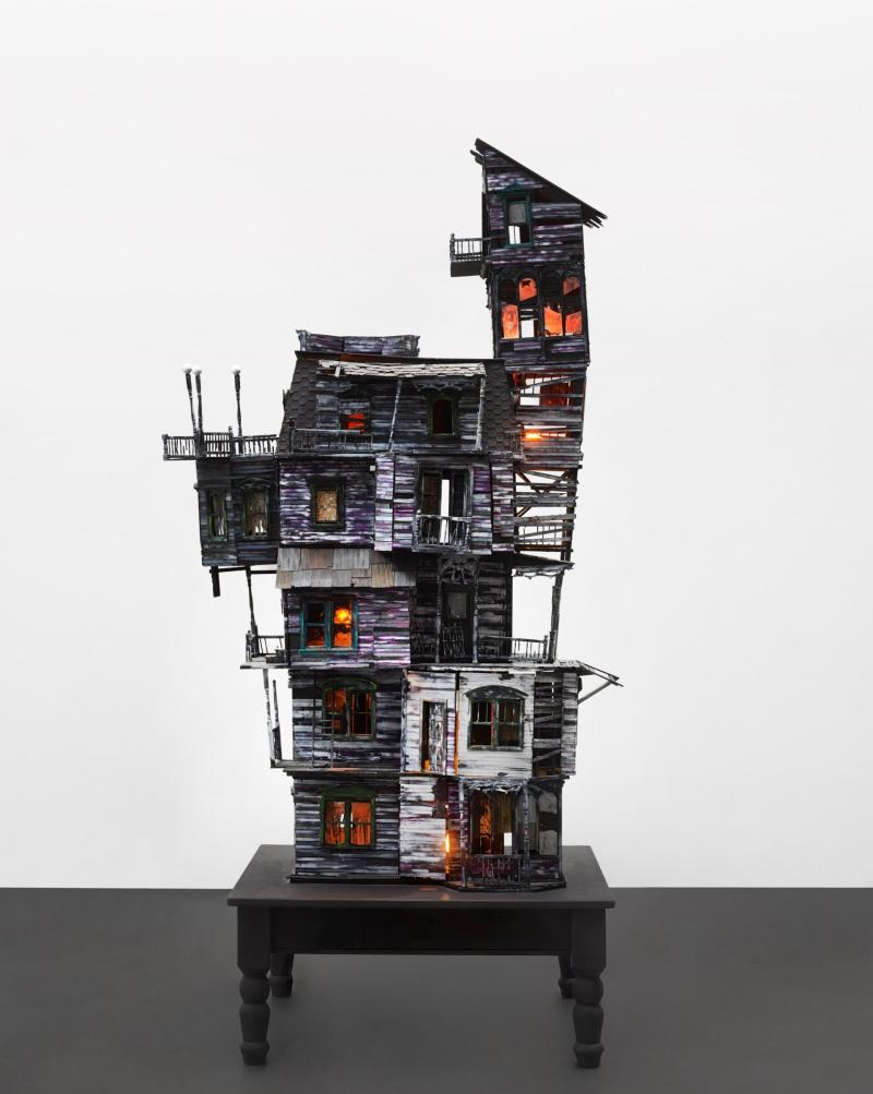 Richard Hawkins “The Last House”, 2010 altered dollhouse, lighting and table, 226 x 91.4 x 91.4 cm Courtesy Galerie Buchholz