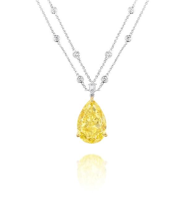 21.70-carat Fancy Vivid Yellow Diamond and Diamond Pendent Necklace Estimate: HK$5,000,000 - 7,000,000/ US$650,000 – 900,000